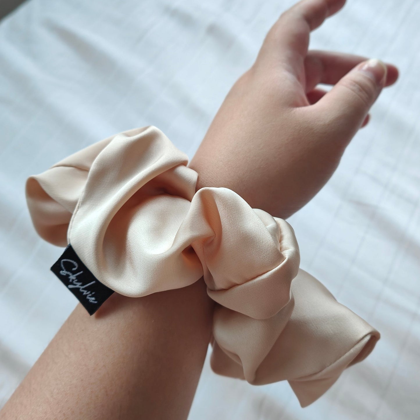 Emma scrunchie around wrist