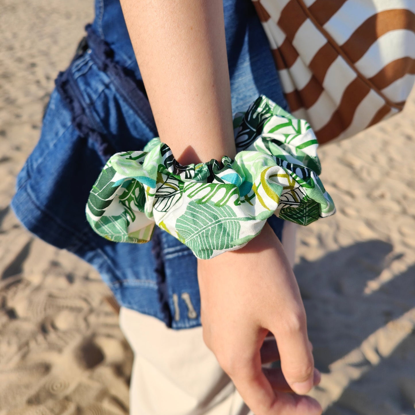 A photo of the Kimberly Scrunchie worn around the wrist